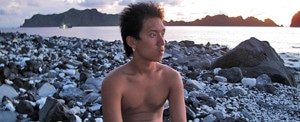 Dennis Chan prepares to overnight on the island of Maug (Photograph by Patrick Symmes)